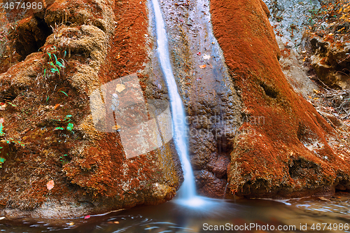 Image of Susara waterfall flowing in autumn season