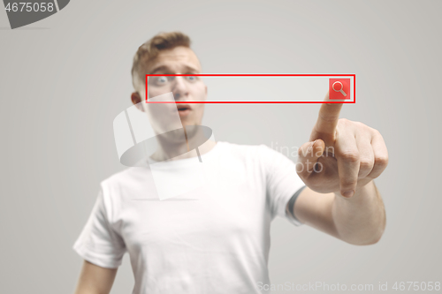 Image of Businessman hand touching empty virtual screen