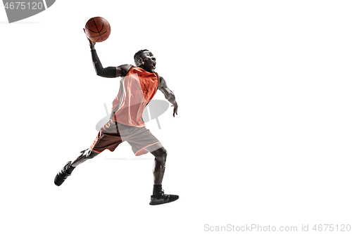 Image of Full length portrait of a basketball player with ball