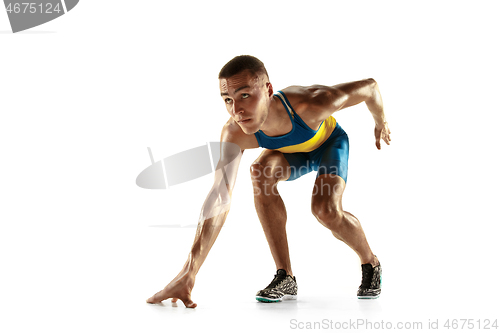 Image of Young caucasian man running or jogging isolated on white studio background.