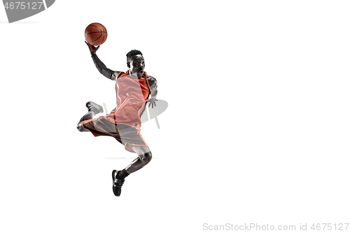 Image of Full length portrait of a basketball player with ball