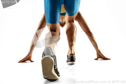 Image of Young caucasian man running or jogging isolated on white studio background.