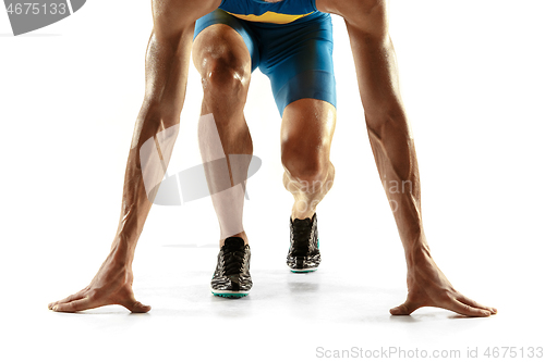 Image of Young caucasian man running or jogging isolated on white studio background.