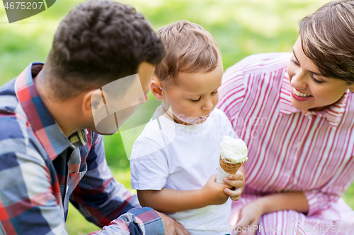 Image of happy family at summer park