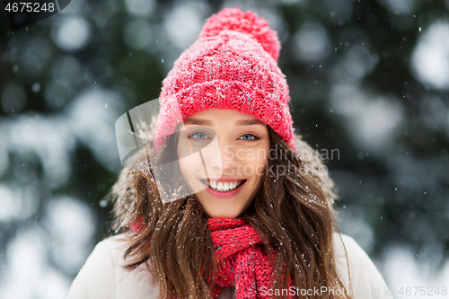 Image of smiling teenage girl outdoors in winter