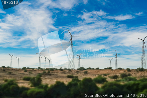 Image of Electricity generating windmills in Rajasthan, Indian. Tilt shif