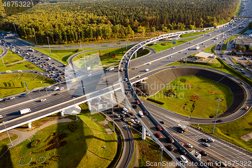 Image of Aerial view of a freeway intersection traffic trails in Moscow.