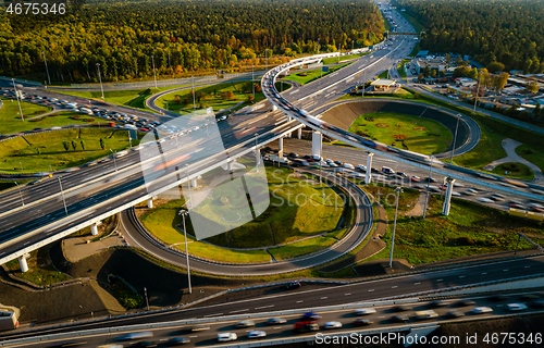 Image of Aerial view of a freeway intersection traffic trails in Moscow.