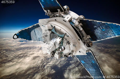 Image of Space satellite orbiting the earth. Elements of this image furni