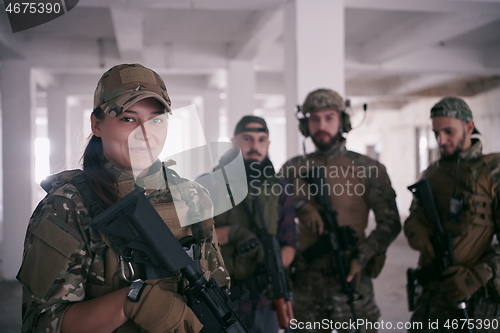 Image of soldier squad team portrait in urban environment