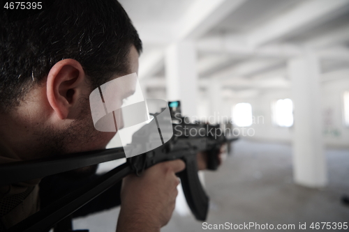 Image of special agent soldier aiming wearing casual clothing