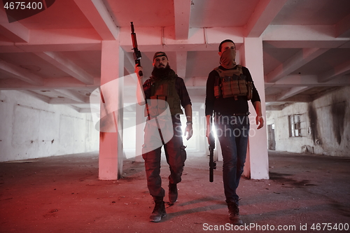 Image of soldier squad team portrait in urban environment