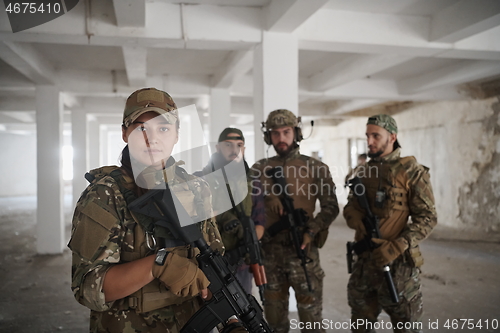 Image of soldier squad team portrait in urban environment