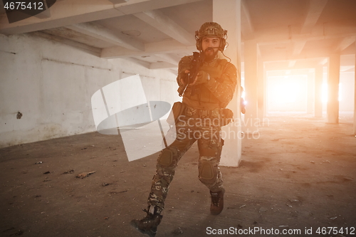 Image of military troops in action urban environment