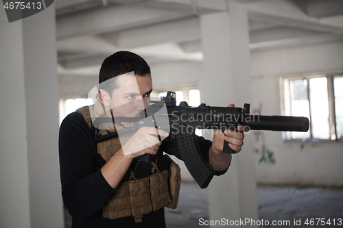 Image of special agent soldier aiming wearing casual clothing