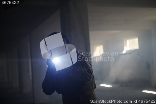 Image of modern warfare soldier in urban environment battlefield