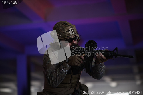 Image of modern warfare soldier in urban environment battlefield