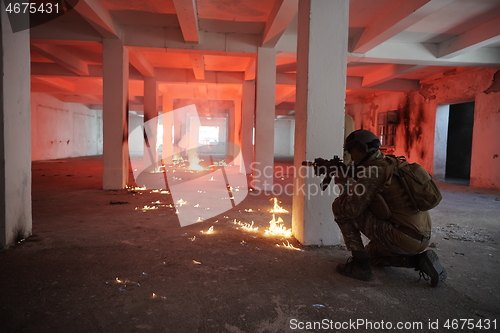 Image of military troops in action urban environment