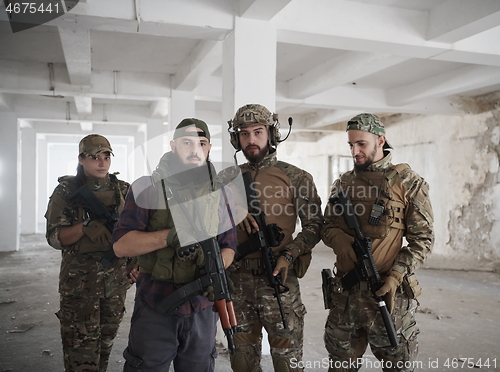 Image of soldier squad team portrait in urban environment