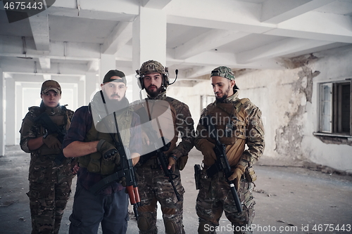 Image of soldier squad team portrait in urban environment