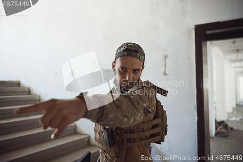 Image of modern warfare soldier portrait in urban environment