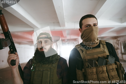 Image of soldier squad team portrait in urban environment