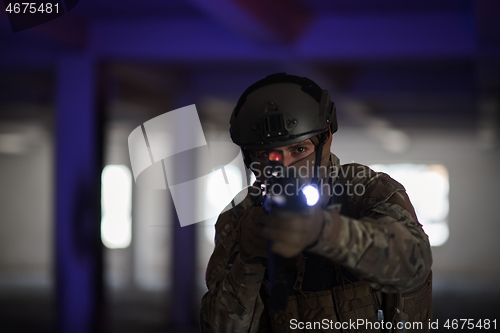 Image of modern warfare soldier in urban environment battlefield