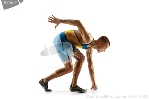 Image of Young caucasian man running or jogging isolated on white studio background.