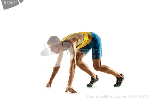 Image of Young caucasian man running or jogging isolated on white studio background.