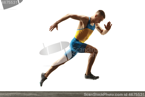 Image of Young caucasian man running or jogging isolated on white studio background.