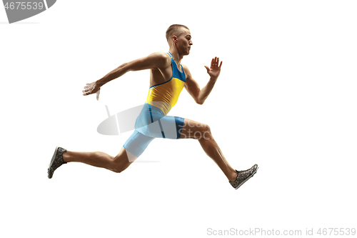 Image of Young caucasian man running or jogging isolated on white studio background.