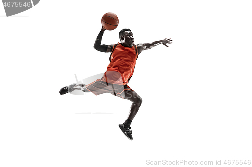 Image of Full length portrait of a basketball player with ball