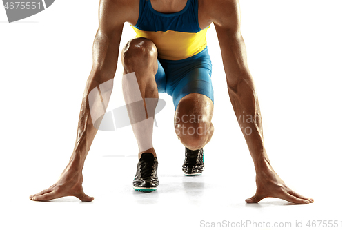 Image of Young caucasian man running or jogging isolated on white studio background.