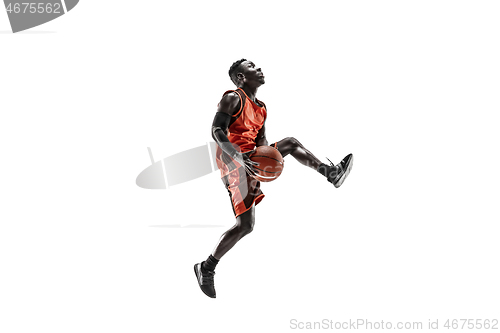 Image of Full length portrait of a basketball player with ball