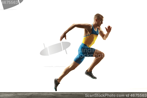 Image of Young caucasian man running or jogging isolated on white studio background.