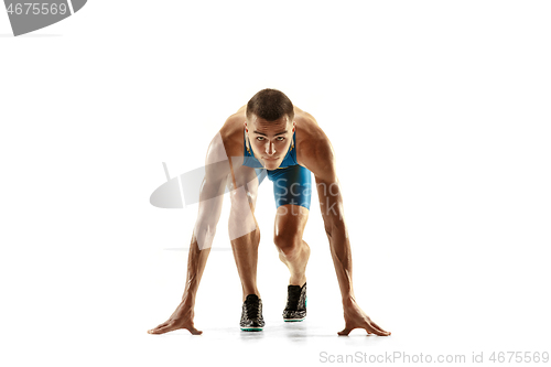 Image of Young caucasian man running or jogging isolated on white studio background.