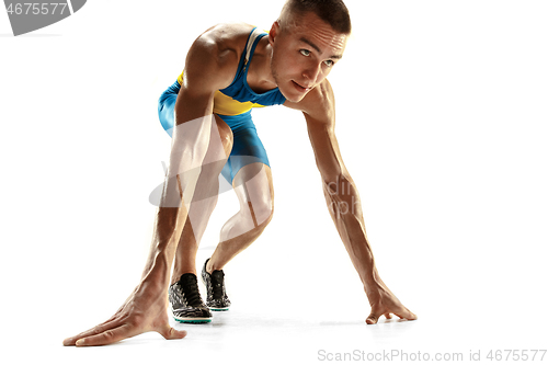 Image of Young caucasian man running or jogging isolated on white studio background.