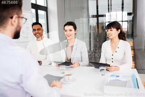 Image of recruiters having job interview with employee