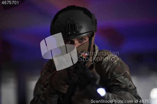 Image of modern warfare soldier in urban environment battlefield