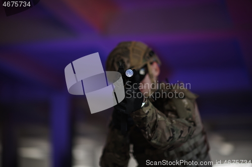 Image of modern warfare soldier in urban environment battlefield