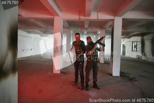 Image of soldier squad team portrait in urban environment