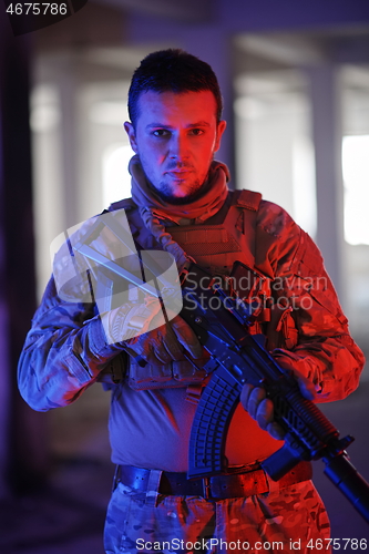 Image of modern warfare soldier in urban environment