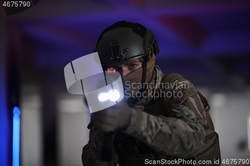 Image of modern warfare soldier in urban environment battlefield