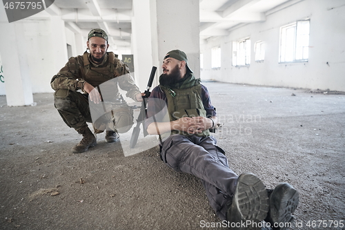 Image of soldier squad team portrait in urban environment