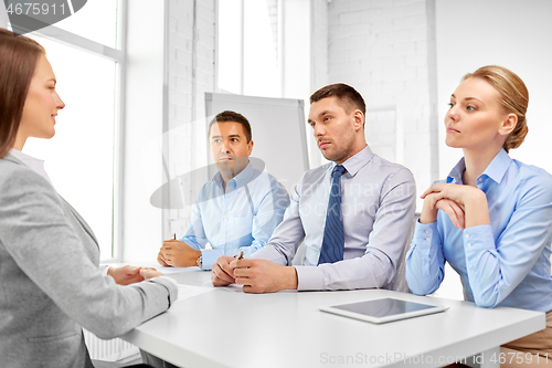 Image of recruiters having job interview with employee