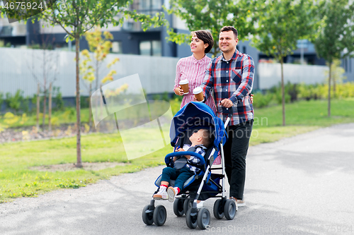 Image of family with baby in stroller and coffee in city