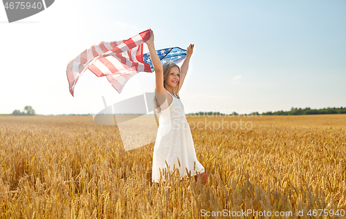 Image of girl with american flag waving over cereal field