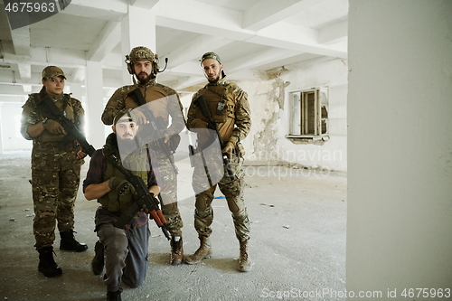 Image of soldier squad team portrait in urban environment