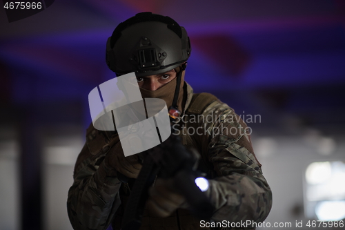 Image of modern warfare soldier in urban environment battlefield