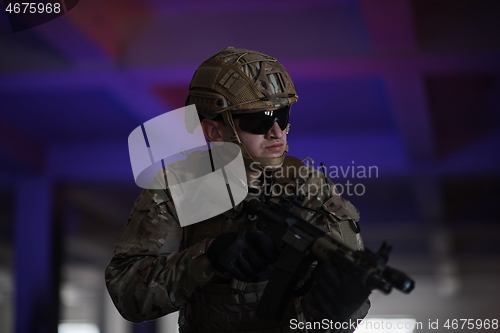 Image of modern warfare soldier in urban environment battlefield